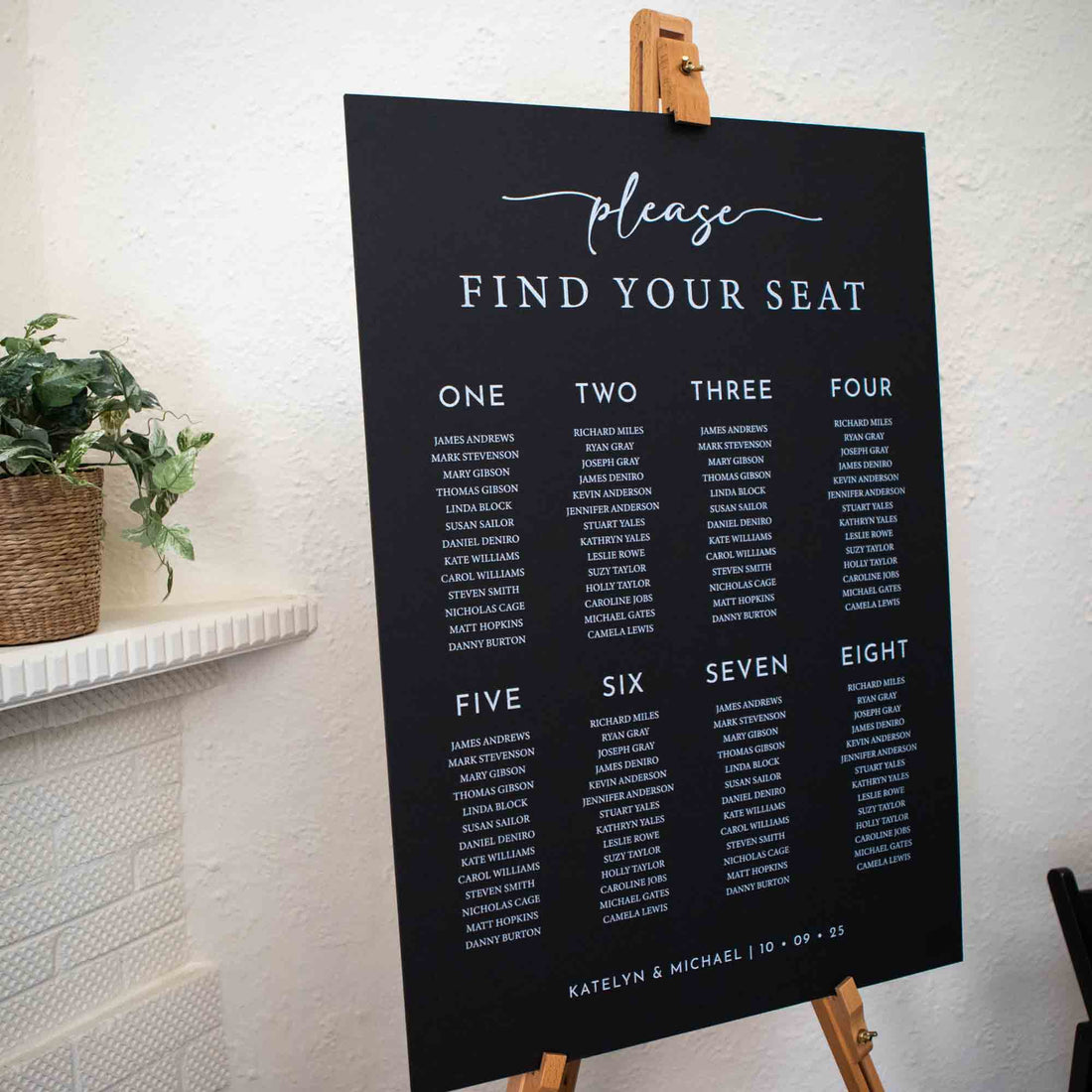 Personalised wedding seating chart in black foam board portrait
