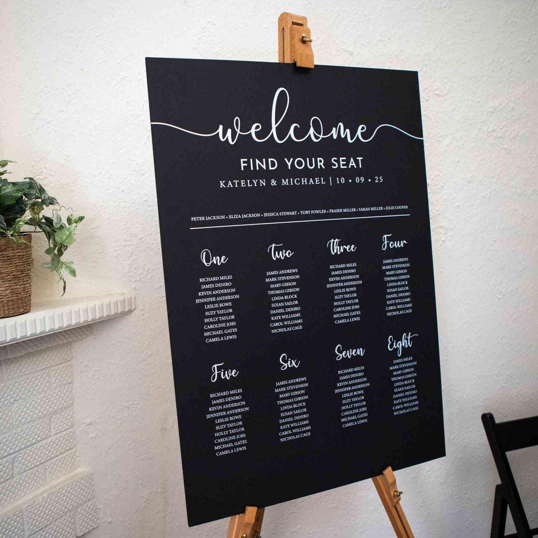 Personalised wedding seating chart in black foam board portrait