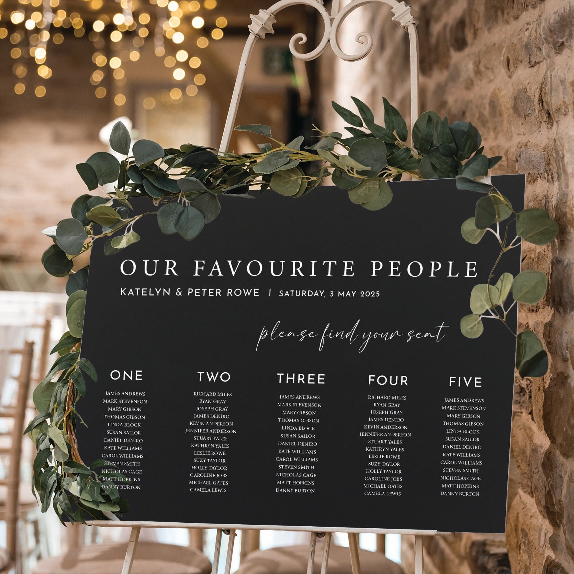 Personalised wedding seating chart in black foam board says our favaourite people