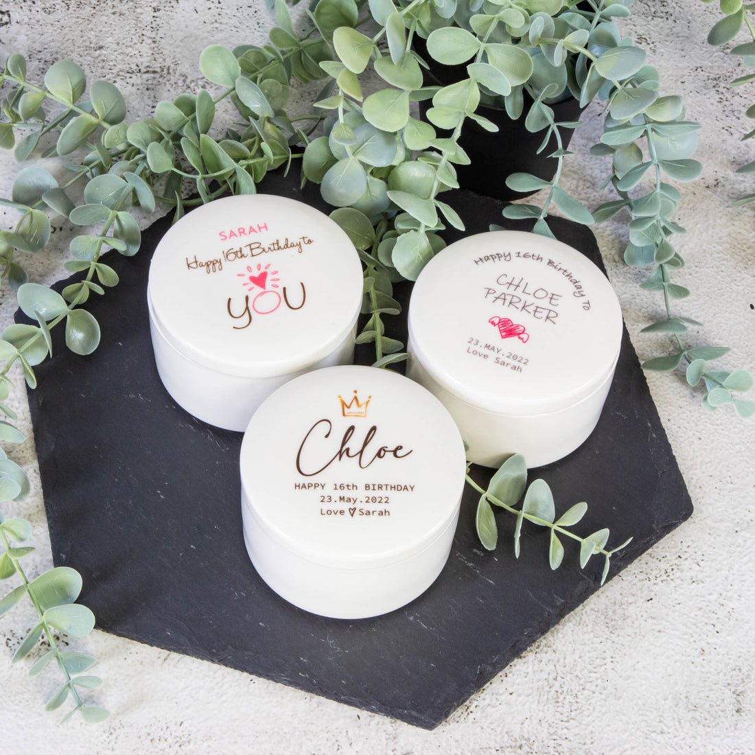 White ceramic earthenware jewellery boxes with personalised texts on them