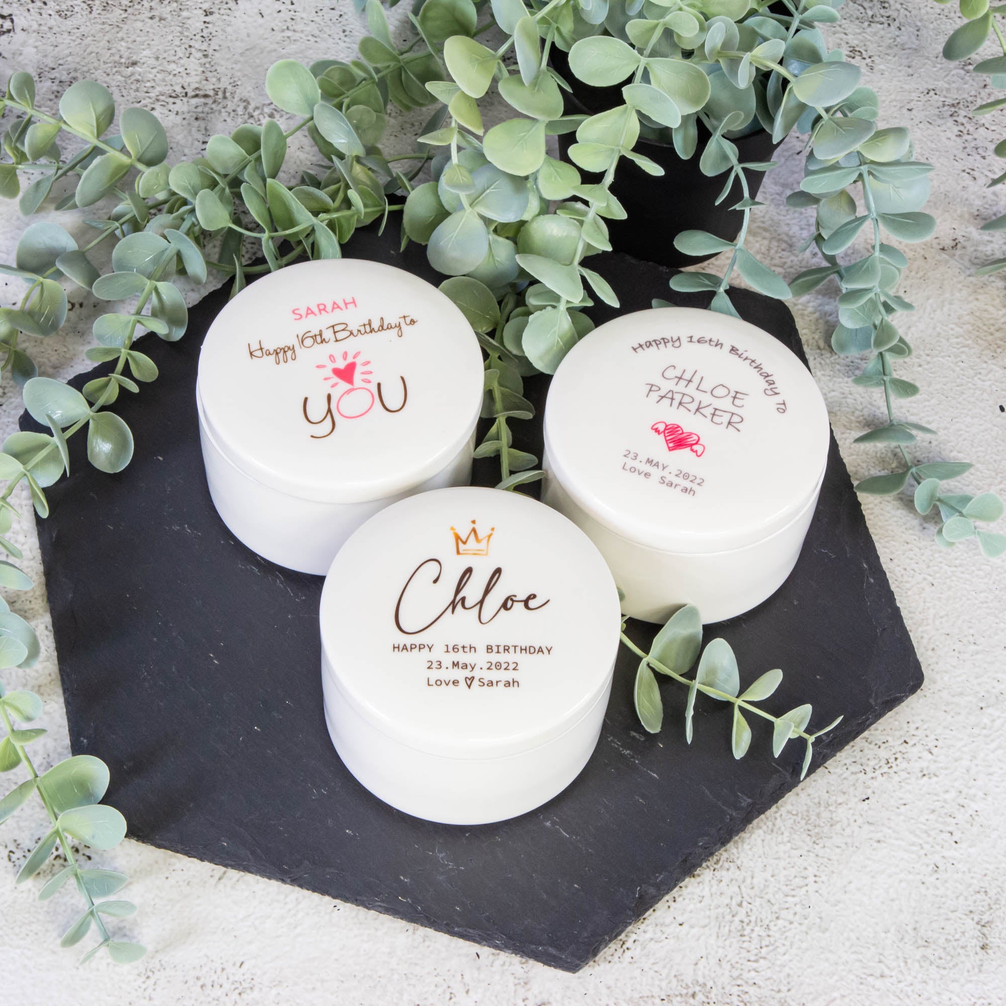 White ceramic earthenware jewellery boxes with personalised texts on them