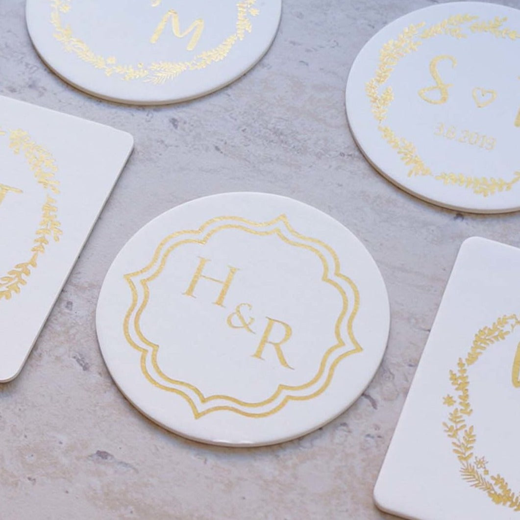 gold foiled personalised coater in round and square shape