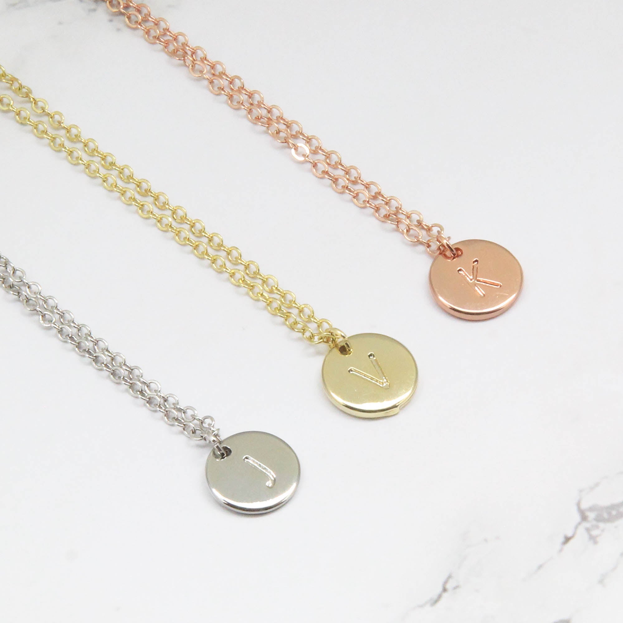 Necklace with an initial disc in 3 colours, gold silver and rose gold