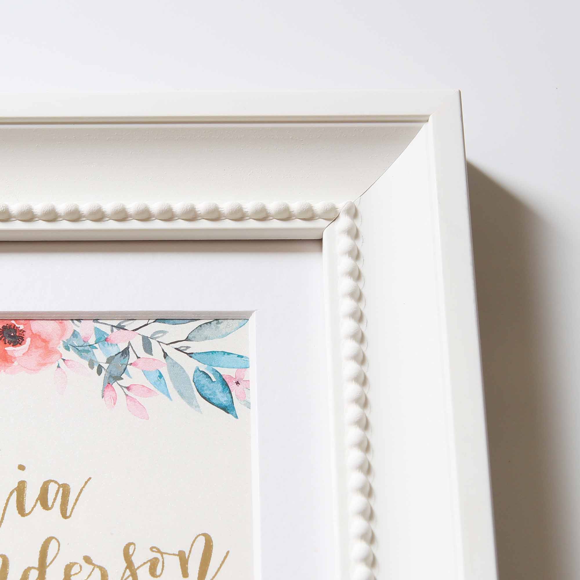 right corner of personalised baptism gift with decorative white frame